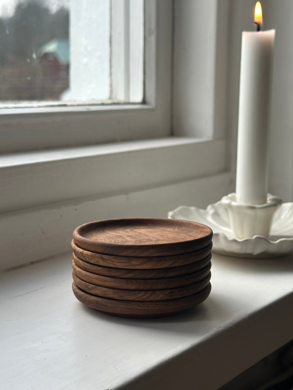 Glasunderlägg i trä