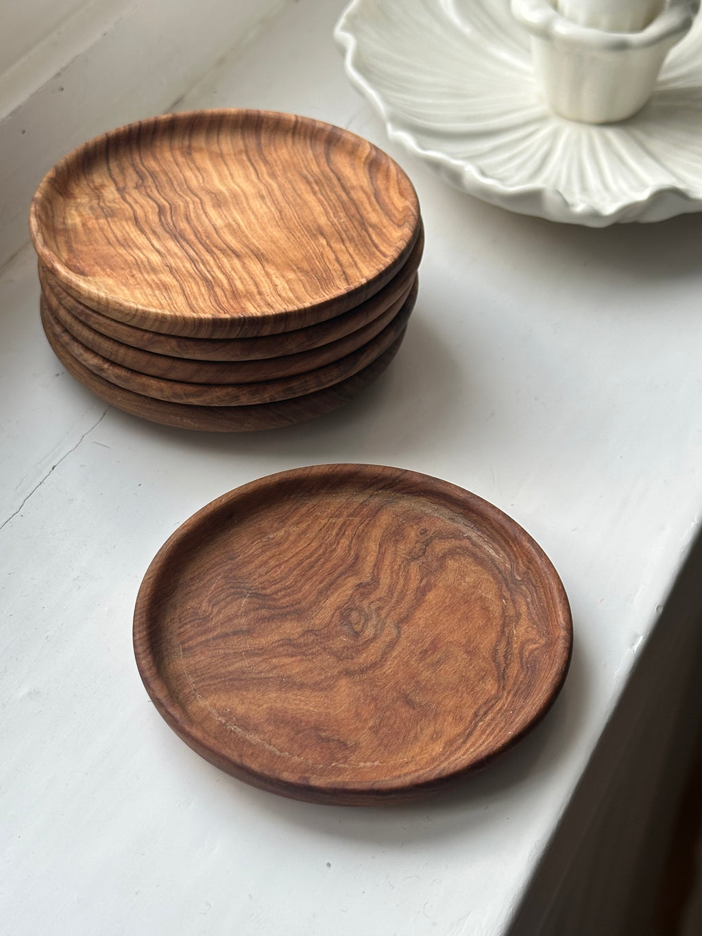 Glasunderlägg i trä